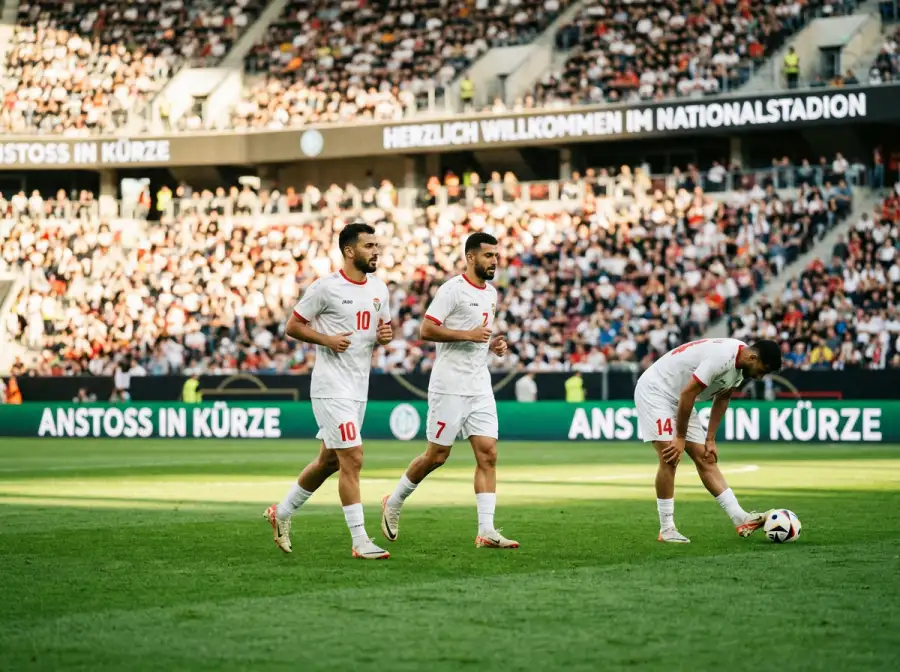 Jordanische Nationalspieler in weißen Trikots beim Warmup vor einem Spiel